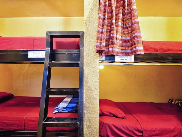 dorm with curtains san pedro la laguna